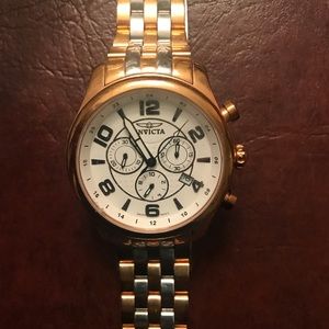 Men’s gold and silver Invicta watch